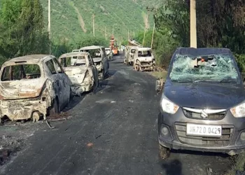 Nuh (Haryana), August 01 (ANI): Damaged vehicles lie on the road in the aftermath of a clash, in Haryana's Nuh on Tuesday. A violent clash erupted between two groups during the Vishwa Hindu Parishad procession. (ANI Photo)