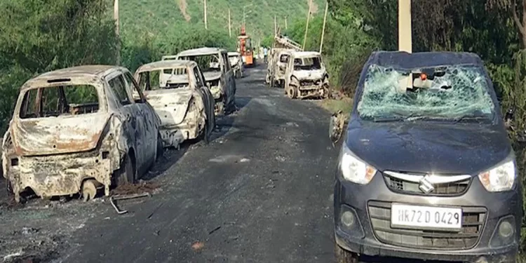 Nuh (Haryana), August 01 (ANI): Damaged vehicles lie on the road in the aftermath of a clash, in Haryana's Nuh on Tuesday. A violent clash erupted between two groups during the Vishwa Hindu Parishad procession. (ANI Photo)